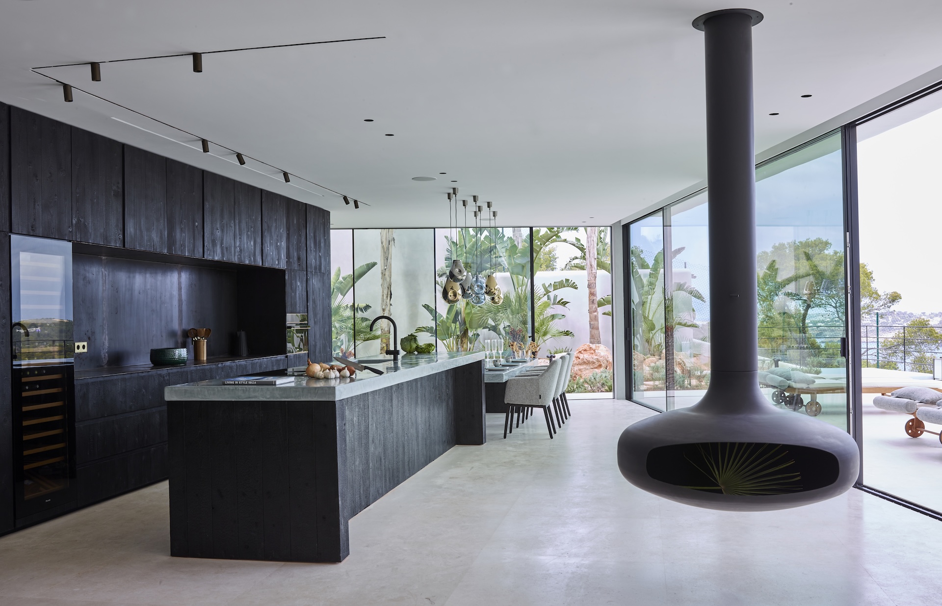 Resa Estates Ibiza koop sale Cala Moli villa seaviews modern kitchen fire place.jpg